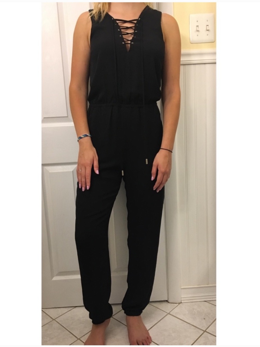 Love Tree Sleeveless Criss Cross Detail Romper in Black